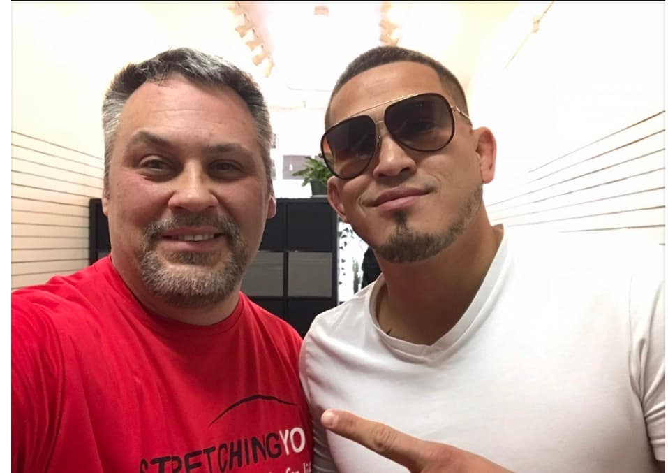Anthony Pettis with a Strrretch practitioner