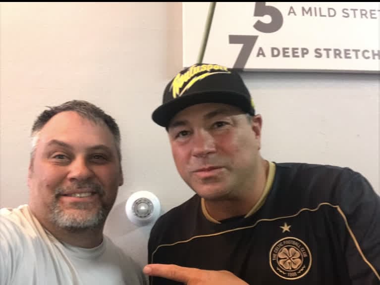 Duke Roufus with a Strrretch practitioner at the studio